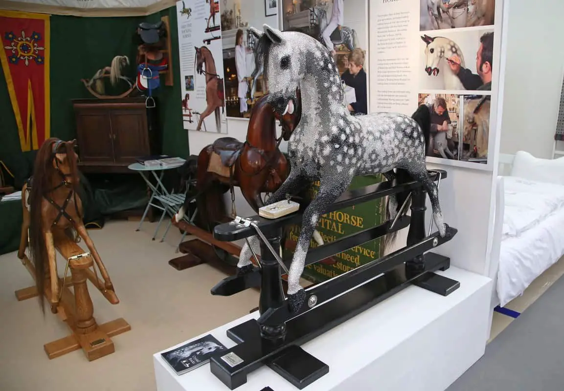 On the Stevenson Brothers Rocking Horses, a Swarovski Crystal encrusted rocking horse, the show's most expensive item at £98,000, at the Spirit of Christmas Fair 2016, at Olympia, London